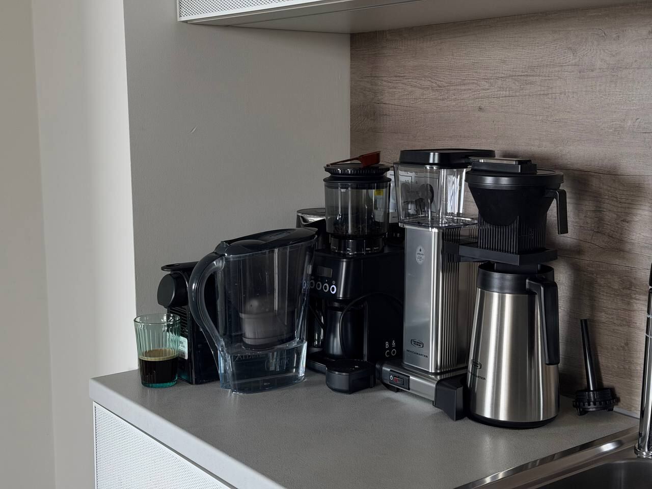 Coffee machines and coffee makers on the kitchen counter